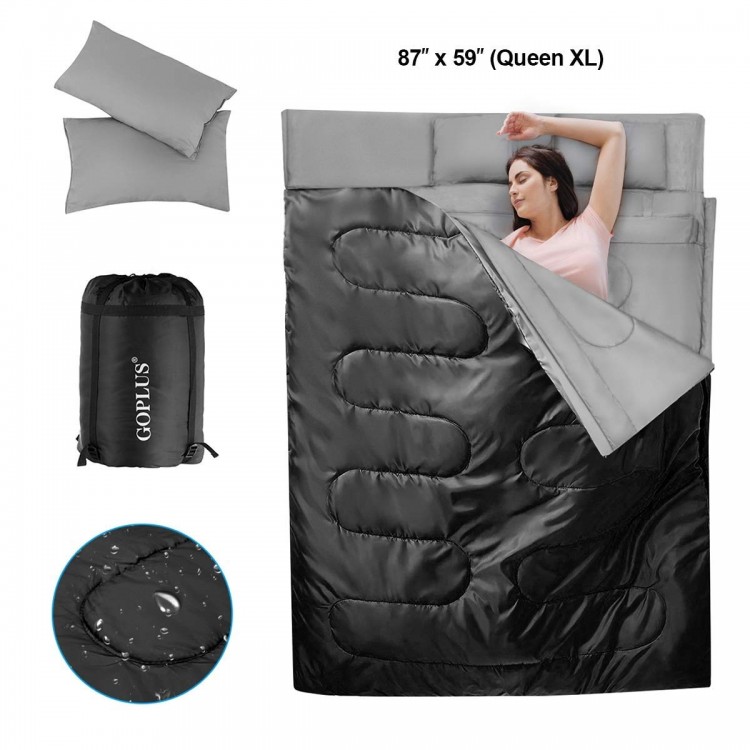 Two-person waterproof sleeping bag in black, 87" x 59", with two pillows, ideal for camping and outdoor adventures.