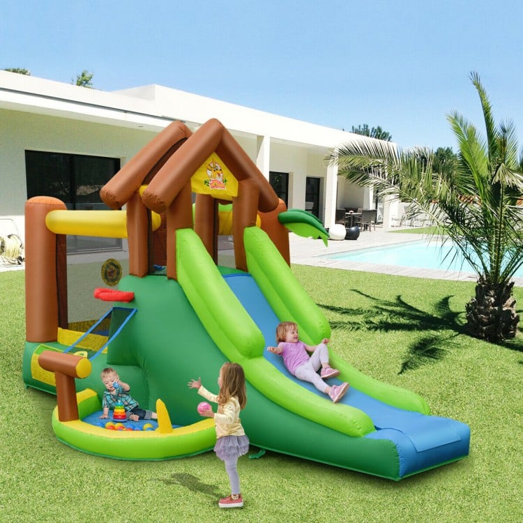 Inflatable jungle bounce house with two slides, trampoline, and climbing wall, made of puncture-resistant 420D oxford.
