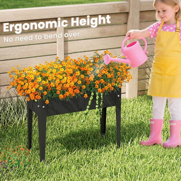 Elevated metal planter box with vibrant flowers, ergonomic height for easy gardening without bending, perfect for.