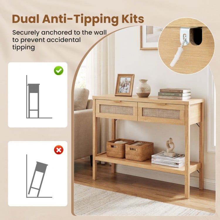 Rattan console table with two drawers and bottom shelf, featuring dual anti-tipping kits for enhanced stability.