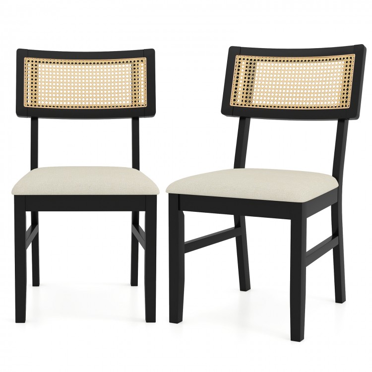 Set of 2 black rattan dining chairs with padded seats and rubber wood legs, featuring a breathable woven backrest.