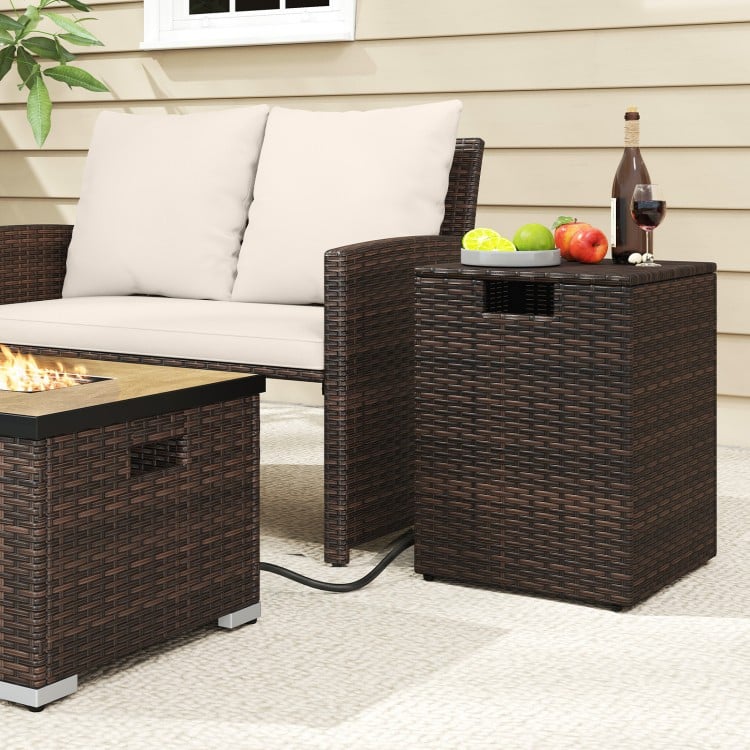Rattan propane tank cover side table in brown with flip-top lid, ideal for patio and outdoor storage solutions.
