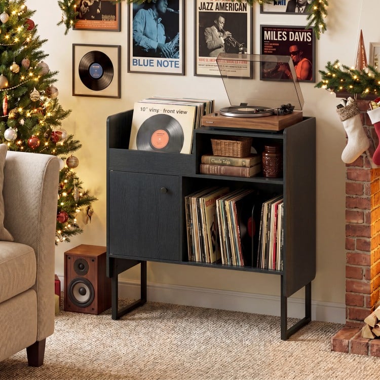 Record player stand in black with vinyl storage for up to 250 albums, featuring power outlets and a sturdy metal frame.