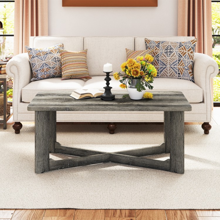 Rectangle coffee table with gray rubber wood and X-shaped base, perfect for living room essentials and stylish decor.