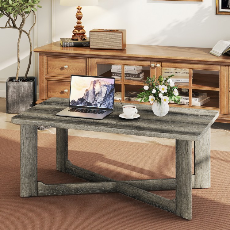 Rectangle coffee table in gray rubber wood with X-shaped base, perfect for living room essentials and stylish decor.