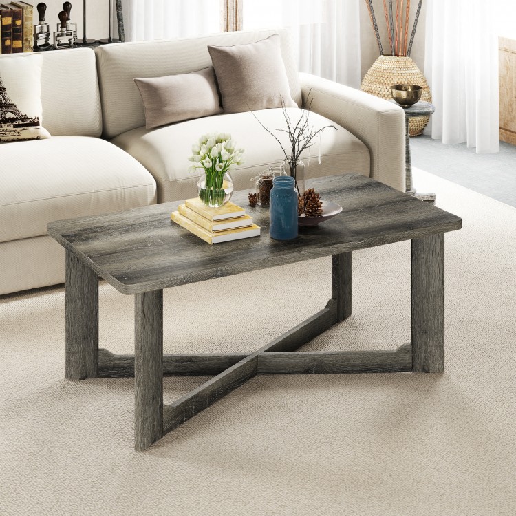 Rectangle coffee table in gray rubber wood with an X-shaped base, ideal for living room storage and style.