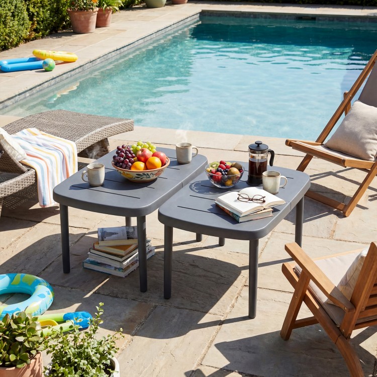 Rectangular gray patio side table with aluminum alloy rods, perfect for poolside snacks and drinks.