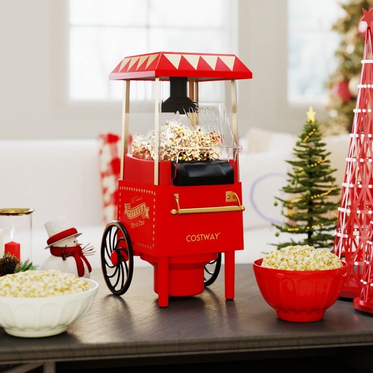 Red Retro Hot Air Popcorn Maker with measuring cup, 1200W for oil-free popcorn, perfect for movie nights and gatherings.