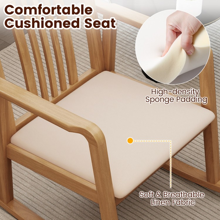 Cushioned seat of the natural rocking chair featuring soft linen fabric and high-density sponge padding for comfort.