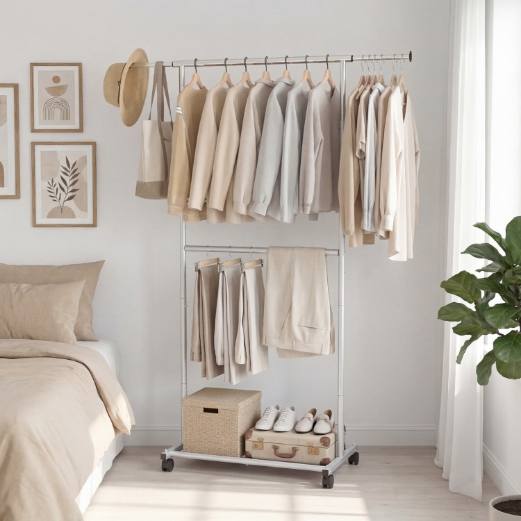 Double-rod rolling clothes rack with extendable top rod and adjustable height, ideal for laundry rooms and bedrooms.