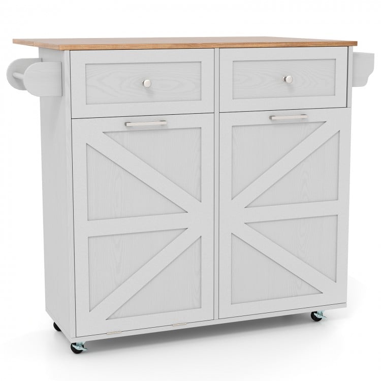Rolling kitchen island in grey with drop leaf top, two drawers, and tilt-out trash cabinet on rubber wheels for easy.