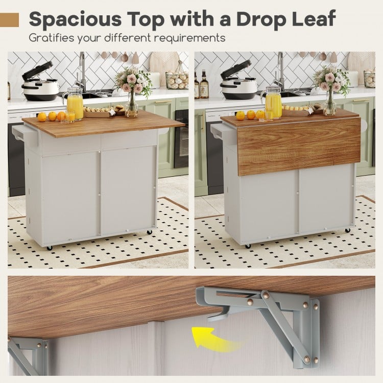 Rolling kitchen island with a drop leaf top, grey finish, featuring storage drawers and wheels for easy mobility.