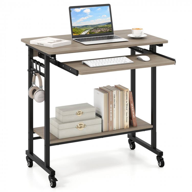 Rolling laptop table in grey with pull-out keyboard tray, hooks, and bottom shelf for convenient storage on wheels.