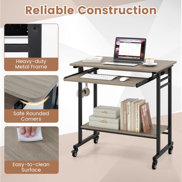 Rolling laptop table in grey with pull-out keyboard tray, hooks, and smooth-rolling casters for versatile workspace use.