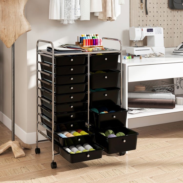 Rolling storage cart with chrome-plated metal frame and 15 black drawers, ideal for organizing craft supplies in.