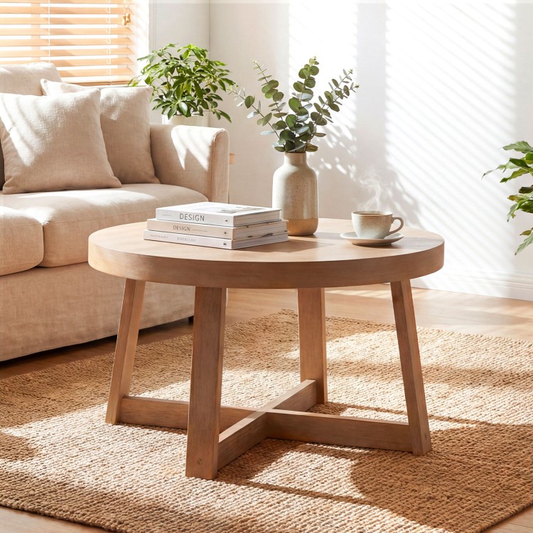 Round coffee table with sturdy rubber wood legs, 30-inch diameter, perfect for living room organization and style.