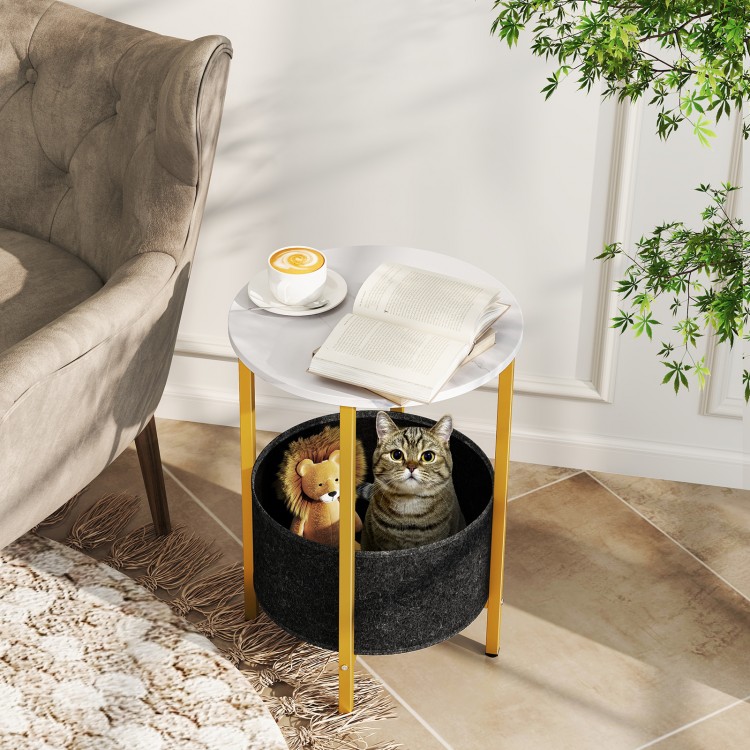 Round end table with a white top and gold metal legs, featuring a removable felt basket for storage in a cozy setting.