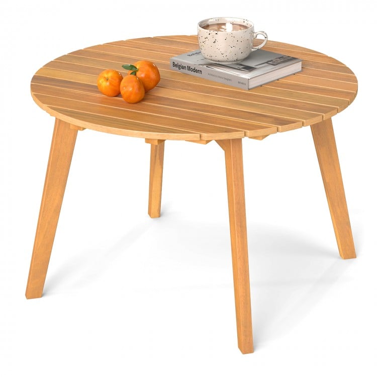 Round outdoor acacia wood side table with slatted tabletop, perfect for patio or garden use, featuring a natural finish.