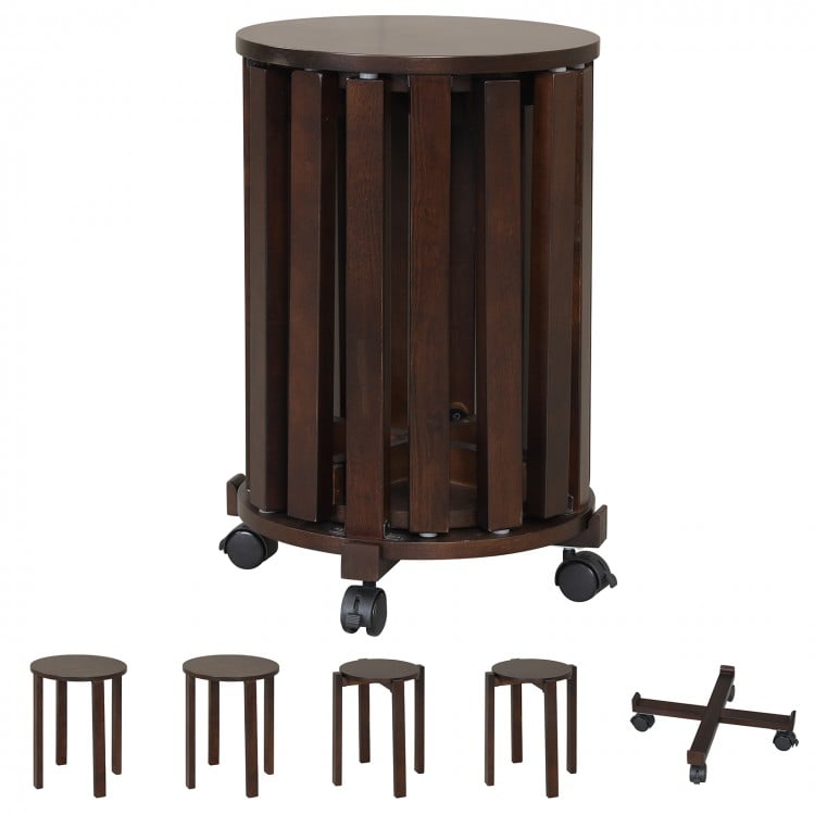 Round portable wood nesting stools in walnut with locking casters, ideal for small spaces and easy mobility.