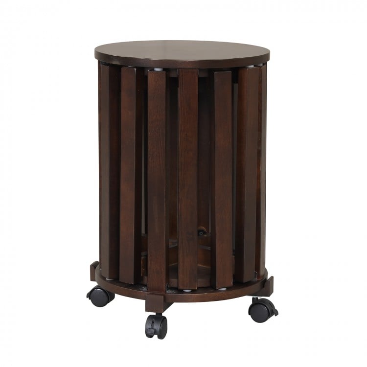 Round walnut nesting stool with a smooth surface and lockable casters, perfect for versatile seating and easy movement.