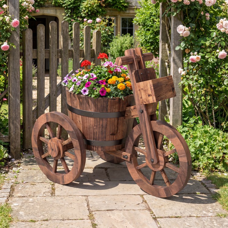 Rustic wood tricycle planter with wheels, featuring a barrel-shaped design and extra storage box for outdoor decor.