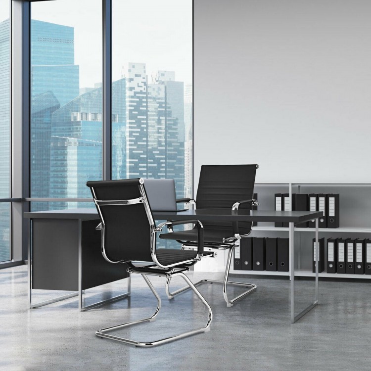 Set of 2 heavy-duty conference chairs with black PU leather and sled base, ideal for modern office settings.