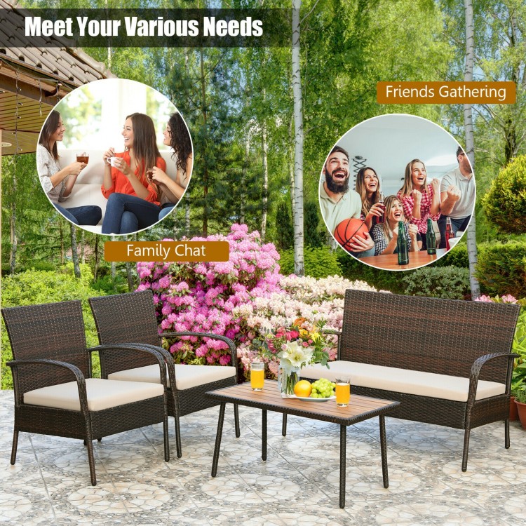 4-piece patio cushioned wicker conversation set with acacia wood tabletop, perfect for outdoor gatherings and comfort.