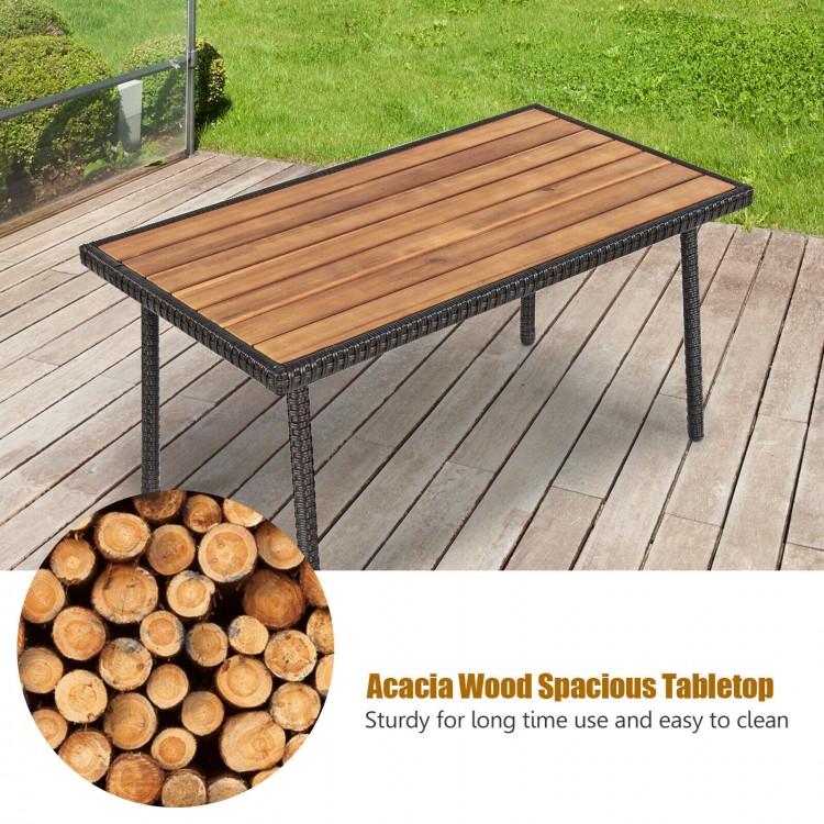 Acacia wood tabletop of a patio conversation set, featuring a sturdy design and weather-resistant wicker for outdoor.