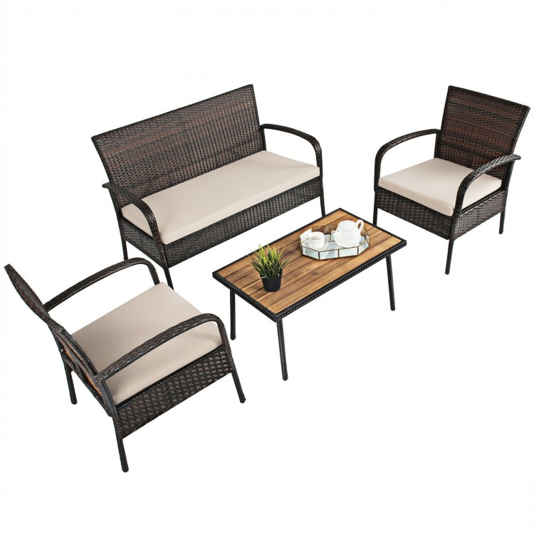 Cushioned wicker conversation set with acacia wood tabletop, featuring a sturdy steel frame, ideal for outdoor use.