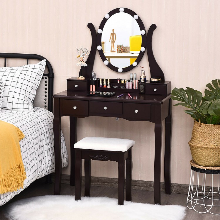 Elegant brown vanity table set with lighted mirror, cushioned stool, and ample storage for cosmetics and jewelry.