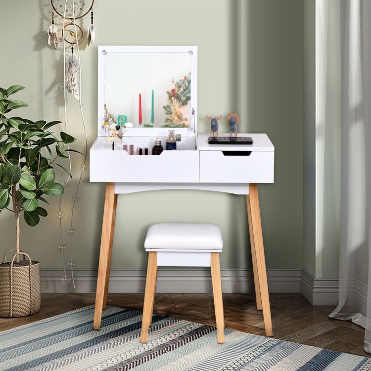 Wooden vanity table with flip top mirror and cushioned stool, featuring sturdy solid wood legs and ample storage space.
