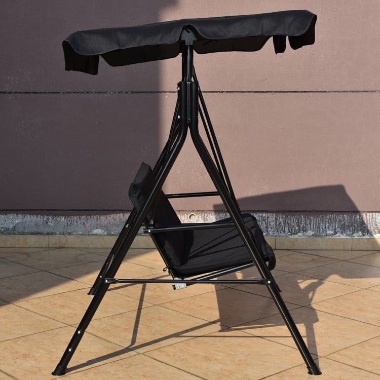 Black steel frame loveseat cushioned patio swing glider with canopy, perfect for outdoor relaxation in garden or.