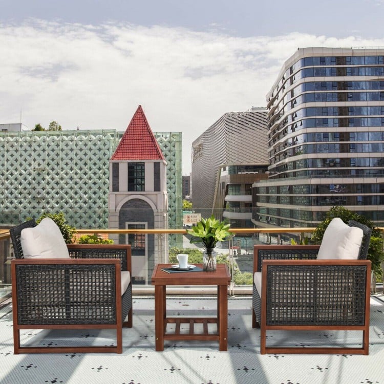 Patio wicker furniture sofa set featuring acacia wood frame, beige cushions, ideal for outdoor spaces like balconies.