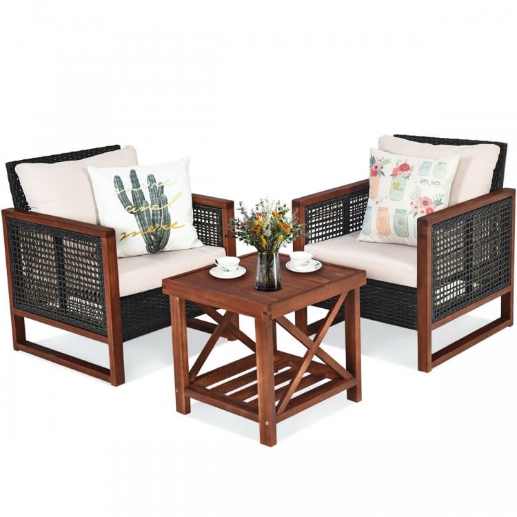 Two patio wicker sofas with beige cushions and a wooden coffee table, perfect for outdoor relaxation in your garden.