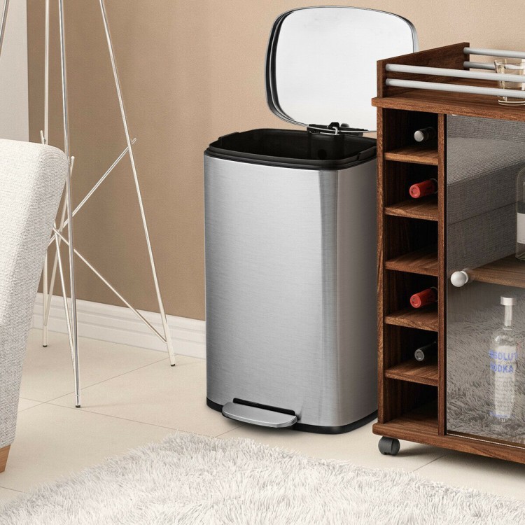 Stainless steel 13.2-gallon trash can with a plastic bucket, pedal, and noiseless lid for convenient waste disposal.
