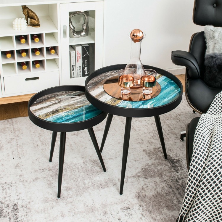 Set of 2 nesting end tables with black steel legs and unique wooden tray tops, perfect for modern living spaces.