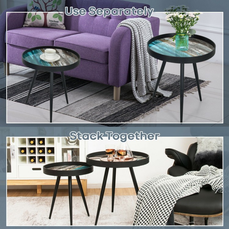 Set of 2 black nesting end tables with wooden tray tops, showcasing unique patterns, perfect for modern living spaces.