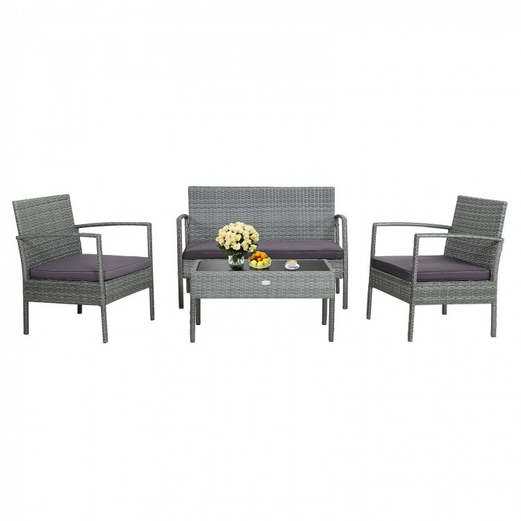Single chair from the 4-piece outdoor rattan conversation set with soft cushion and curved armrests, perfect for garden.