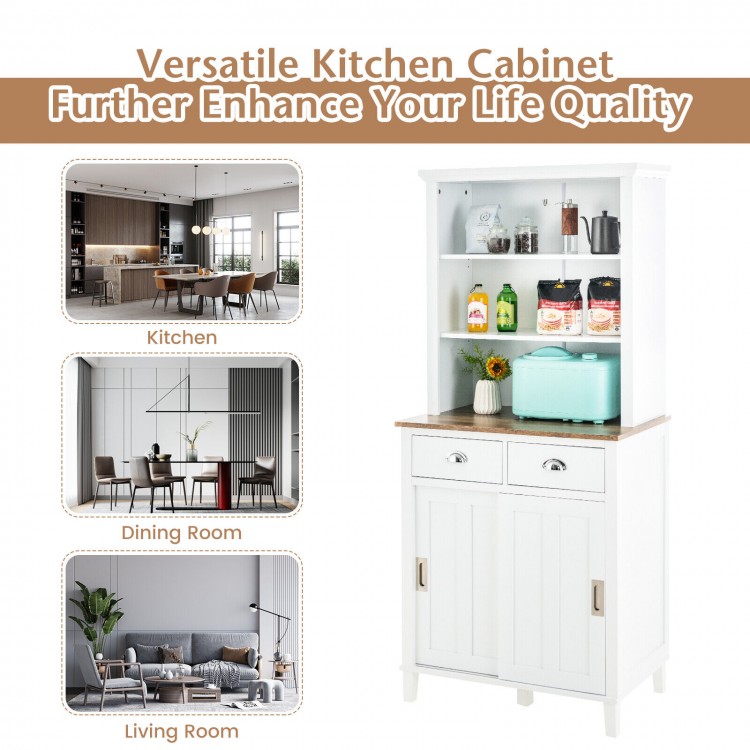 Freestanding white kitchen pantry with hutch, sliding doors, and drawers for organized storage in modern homes.