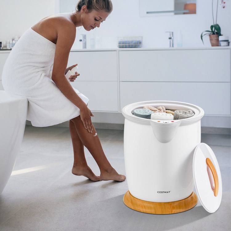 Bathroom towel warmer bucket in use, heating towels with fragrance holder, compact design for easy portability.