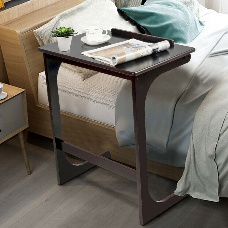 Adjustable C-shape end table in brown with tilting top, designed for comfort and versatility beside sofa or bed.