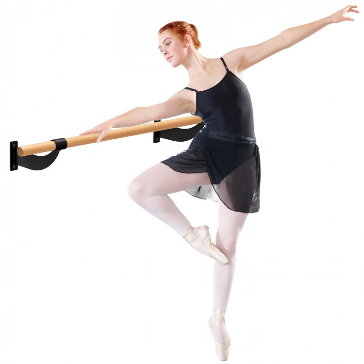 Ballet dancer practicing at a 4 feet wall-mounted ballet barre, crafted from solid beech wood for stability and.