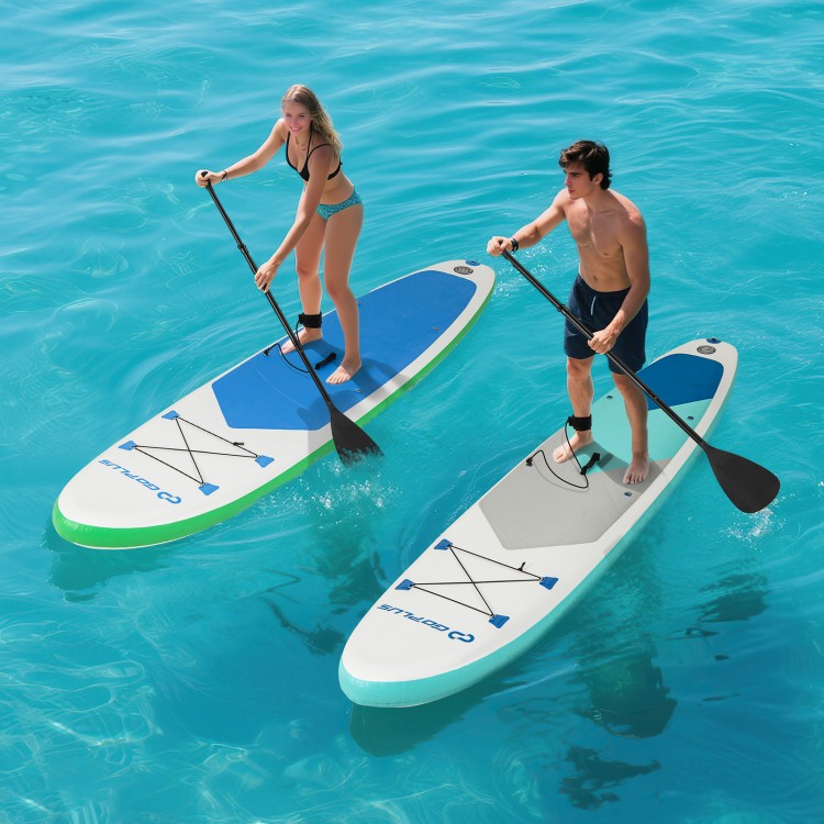 Two people paddle on 11-foot inflatable SUP boards in clear water, showcasing stability and safety features.