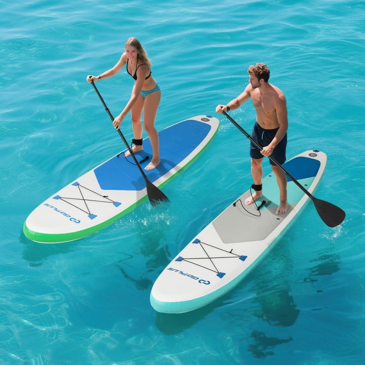 Two people paddling on 11 feet inflatable stand up paddle boards in turquoise water, featuring non-slip decks and.