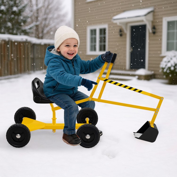 Child enjoying the yellow sand digger toy with two-handed controls, perfect for winter snow play and outdoor fun.
