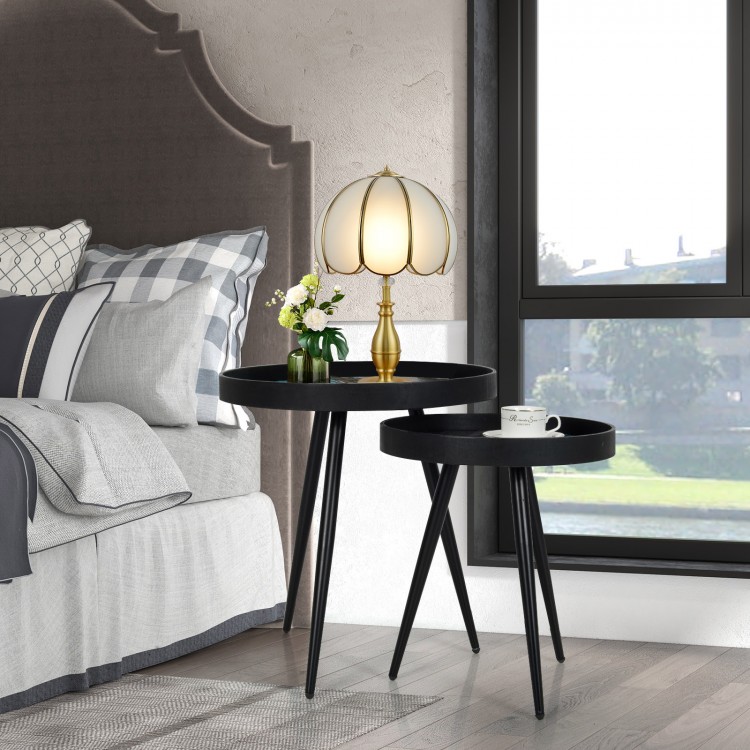 Set of 2 black nesting end tables with wooden tray tops and steel legs, perfect for modern living spaces and easy to.