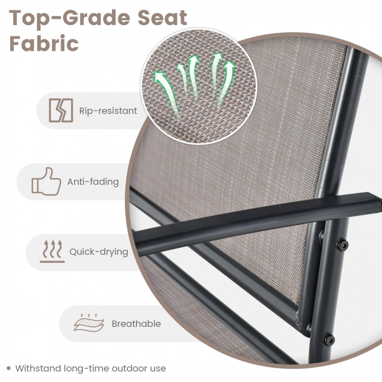 Close-up of breathable, quick-drying seat fabric on a weather-resistant outdoor glider armchair for backyard use.