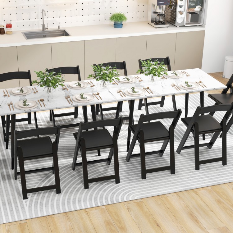 Foldable black dining chairs with rubber wood legs and padded seats, perfect for home office events and gatherings.