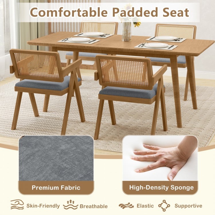 Side view of a gray rattan accent chair with padded cushion and rubber wood frame, designed for optimal comfort and.
