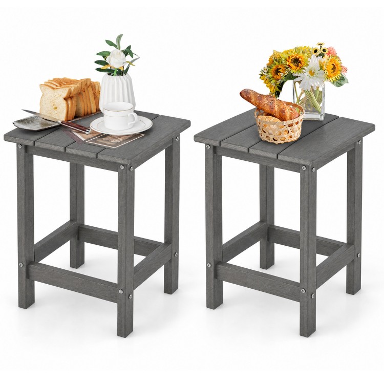 Set of 2 gray weather-resistant Adirondack side tables with slatted tops, perfect for outdoor use and easy maintenance.